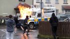 Youths attack PSNI vehicles as they try to prevent members of Derry 1916  Commemoration Committee from taking part in an unregistered parade in the the Creggan area of Derry, Northern Ireland. Photograph: Niall Carson/PA Wire