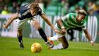 Scott Sinclair is tackled by Dundee’s Mark O’Hara during Celtic’s goalless draw at Parkhead. Photograph: Jane Barlow/PA