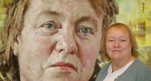  Mo Mowlam with her portrait painted by artist John Keane in 2002  at the National Portrait Gallery in  London. Photograph: Kirsty Wigglesworth / PA