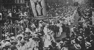 Women on a suffrage march carry 617 arrows, each representing a conviction of a suffragette. Photograph: Mansell/Time Life Pictures/Getty Images 