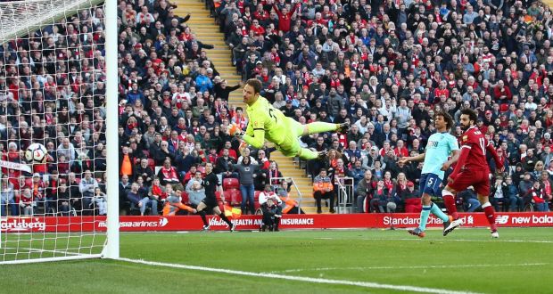 Mohamed Salah of Liverpool scores his side’s second goal past Asmir Begovic of AFC Bournemouth during their Premier League win at Anfield. Photo: Clive Brunskill/Getty Images