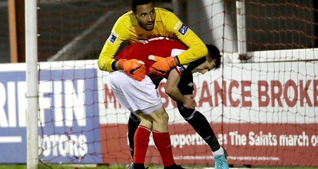 St Patricks Athletic’s Jake Keegan and Lawrence Vigoroux of Waterford collide. Photograph: Inpho