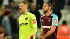 Joe Hart and Andy Carroll leave the pitch at The London Stadium. Photograph: Getty Images