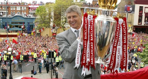Arsène Wenger with the Premiership trophy after Arsenal’s unbeaten 2003/04 campaign. Photograph: PA