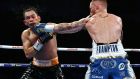 Carl Frampton lands a left to the jaw of  Nonito Donaire during their WBO Interim World Featherweight championship bout at the SSE Arena  in Belfast. Photograph: Charles McQuillan/Getty Images