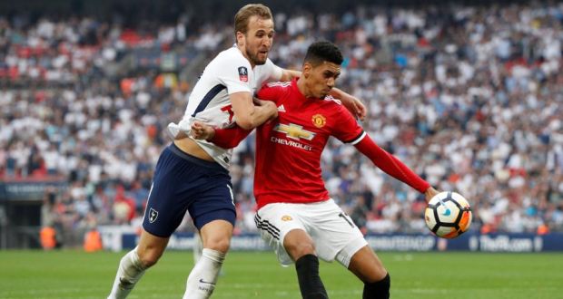 Manchester United’s Chris Smalling in action with Tottenham Hotspur’s Harry Kane during the FA Cup semi-final at Wembley. Photo: John Sibley/Reuters