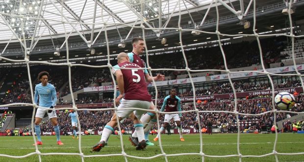  West Ham United’s Pablo Zabaleta scores an own goal and the second for Manchester City. Photograph: Reuters
