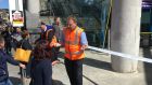 Irish Rail staff speak to passengers at the  blocked entrance to Connolly train station on Monday afternoon. Photograph: Peter Murtagh 