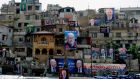  Election posters  on buildings in the Bab al-Tabbaneh and Jabal Mohsen neighbourhoods of Tripoli in  northern Lebanon. Photograph: Getty Images