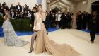 Gigi Hadid makes her entrance at the Met Gala at the Metropolitan Museum of Art in New York, May 1, 2017. Photograph: Benjamin Norman/The New York Times