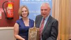 Hubert McHugh with his Leitrim Person of the Year 2017 award and his colleague Valerie Cogan
