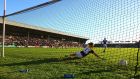  Donie Kingston of Laois scores his  penalty. Photograph: Ken Sutton/Inpho