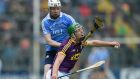 Dublin’s Fiontan McGibb challenges   Wexford’s Aidan Nolan during the Leinster SHC round-robin game at  Innovate Wexford Park. Photograph: Tommy Greally/Inpho