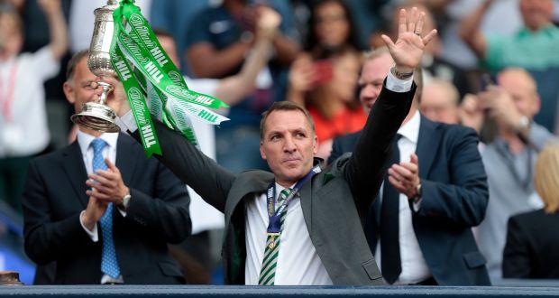 Celtic manager Brendan Rodgers lifts the trophy after winning the Scottish Cup Final at Hampden Park, Glasgow. Photograph: Graham Stuart/PA Wire