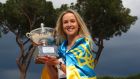 Elina Svitolina poses with the trophy after the defeating  Simona Halep in the final of The Internazionali BNL d’Italia for the second year in a row. Photograph: Julian Finney/Getty Images