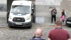 Garda van leaving the Children’s Court in Dublin after a  13-year-old boy appeared at a special sitting on Friday evening and was charged over the death of Anastasia Kriegel (14). Photograph: Brian Lawless/PA