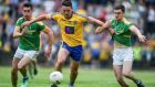 Roscommon’s John McManus with Paddy Maguire and Ryan O Rourke of Leitrim during the Connacht semi-final at Carrick-on-Shannon. Photograph: Tommy Grealy/Inpho 