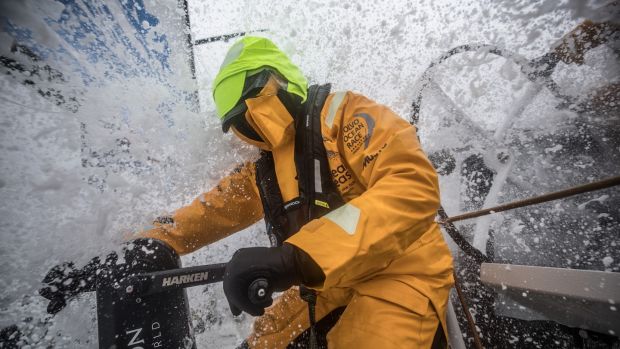 Annalise Murphy battles driving snow while working on a winch grinder aboard Turn the Tide on Plastic during leg nine from Newport, Connecticut to Cardiff. Photograph: Volvo Ocean Race