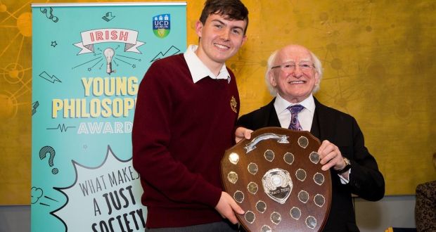 Irish Yong Philosopher Award winner Luke Rickard (16) with President Michael D. Higgins. Photograph: UCD Colleges of Social Sciences and Law