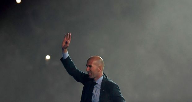 Real Madrid’s French coach Zinedine Zidane aknowledges supporters at the Santiago Bernabeu stadium during a victory ceremony following their Champions League triumph. Photograph: Getty Images