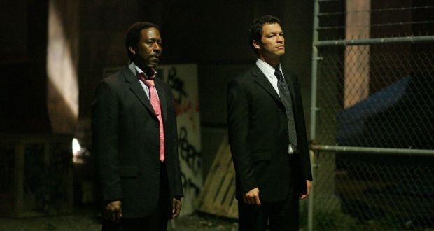 Clarke Peters and Dominic West in a scene from season five of The Wire