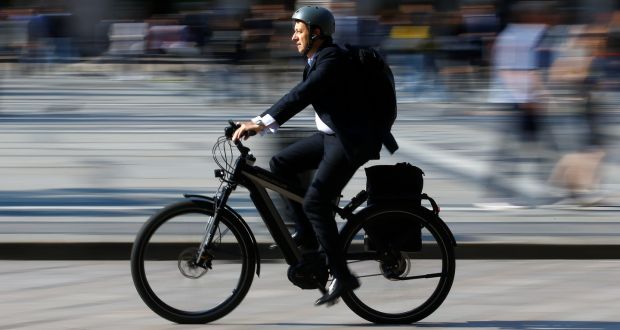 E-bikes do not require motor tax or insurance once they are pedal assisted and do not travel at more than 25 km/h. At least for now. Photograph: Stefano Rellandini/Reuters