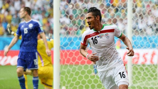 Reza Ghoochannejhad of Iran celebrates scoring his team’s first goal during the 2014 World Cup Brazil match against Bosnia and Herzegovina. Photograph: Jamie McDonald/Getty Images