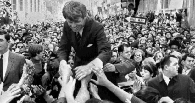 Senator Robert F Kennedy shakes hands with the crowd on a street corner in Philadelphia on April 2nd, 1968, two months before his assassination. Photograph: Warren Winterbottom