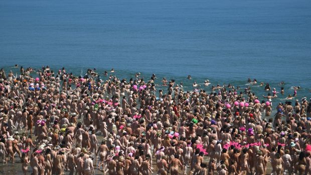 2,505 women break a Guinness World record for the largest number of people skinny dipping together and at the same time raising money for the childrenâ€™s cancer charity â€˜Aoibheannâ€™s Pink Tieâ€™ on Magheramore. Photograph: Clodagh Kilcoyne/Reuters