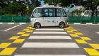 A Navya SAS autonomous electric passenger bus  at the test circuit  in Singapore. The centre has intersections, traffic lights, bus stops and pedestrian crossings. Photograph: Nicky Loh/Bloomberg