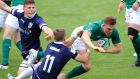 Michael Silvester is tackled during Ireland’s defeat to Scotland in Perpignan. Photograph: Pascal Rodriguez/Inpho