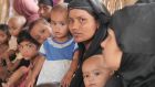 Mothers and babies wait at a Concern Worldwide outpatient centre for malnutrition screening. Photograph: Kathleen Harris