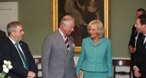 The Prince of Wales and the Duchess of Cornwall shown around Derrynane House. Photograph: Niall Carson/PA Wire