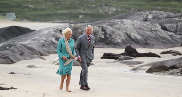 Prince Charles and Camilla walk on Derrynane beach in Co Kerry. Photograph: Niall Carson, Getty Images