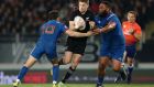 Beauden Barrett of the All Blacks on the charge against Anthony Belleau and Uini Atonio of France during the  Test series. Photograph: Anthony Au-Yeung/Getty