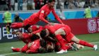 England’s Harry Kane celebrates with team-mates after scoring their first goal in the World Cup Group G  game against Tunisia at the   Volgograd Arena. Photograph: Ueslei Marcelino/Reuters