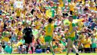 Donegal’s Ryan McHugh celebrates scoring a goal with Patrick McBrearty during the Ulster SFC Final against Fermanagh at St Tiernach’s Park in Clones. Photograph: James Crombie/Inpho