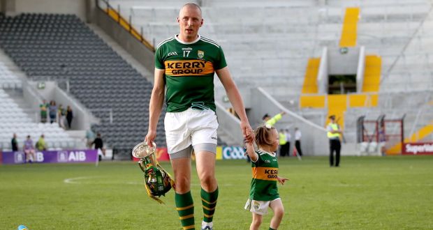 Kerry’s Kieran Donaghy with his daughter Lola Rose after the Munster final. Photograph: Ryan Byrne/Inpho