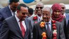 Ethiopia’s PM Abiy Ahmed (L) walks with Eritrea’s foreign minister Osman Saleh Mohammed (R) as Eritrea’s delegation arrives for peace talks in  international airport in Addis Ababa, Ethiopia, on Tuesday. Photograph: Yonas Tadesse/AFP