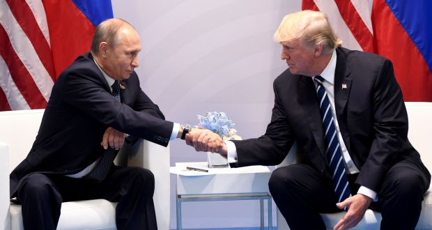 US president Donald Trump and Russia’s president Vladimir Putin at the G20 Summit in Hamburg, Germany last year. Photograph: Saul Loeb/Getty Images