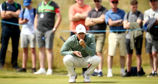 Rory McIlroy  lines up a putt on the third green  during the first round of the Dubai Duty Free Irish Open at Ballyliffin Golf Club. Photograph:  Jan Kruger/Getty Images