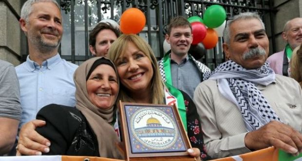 Palestinian farmer Muna al-Taneeb, from the West Bank, with Senator Frances Black outside Leinster House on Wednesday. Photograph: Crispin Rodwell/AP Images for Avaaz. 