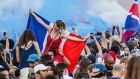  French supporters celebrate on the Champs-Élysées after  their team’s victory over Croatia in the  World Cup  final. Photograph: Christophe Petit Tesson/EPA
