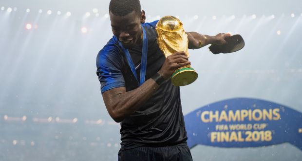  Paul Pogba of France celebrates with the World Cup trophy. Photograph: Matthias Hangst/Getty Images