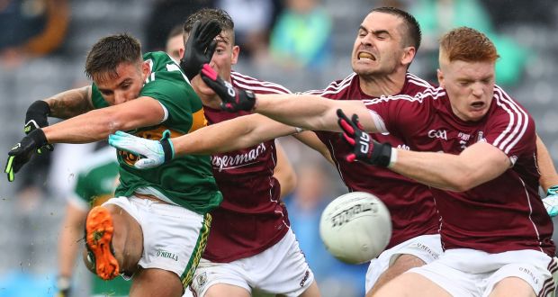 Kerry’s Micheál Burns and Johnny Heaney, Cathal Sweeney and Seán Andy Ó Ceallaigh of Galway at last Sunday’s All-Ireland Senior Championship quarter-final at Croke Park. Photograph: James Crombie/Inpho