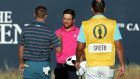 USA’s Jordan Spieth (left) and USA’s Xander Schauffele shake hands at the end of their rounds on the 18th during day four of the Open Championship 2018 at Carnoustie. Photograph: Jane Barlow/PA Wire