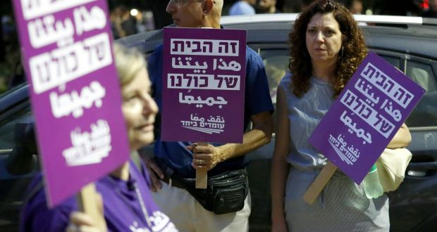 Demonstrators attend a rally to protest against the Jewish nation state Bill in Tel Aviv. Photograph: Jack Guez/AFP/Getty Images