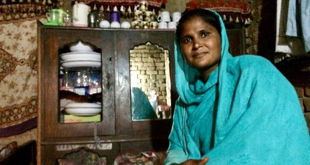 Sangita Muqsood in her room in the brick kiln where she works, near Lahore. Photograph: Lorraine Mallinder