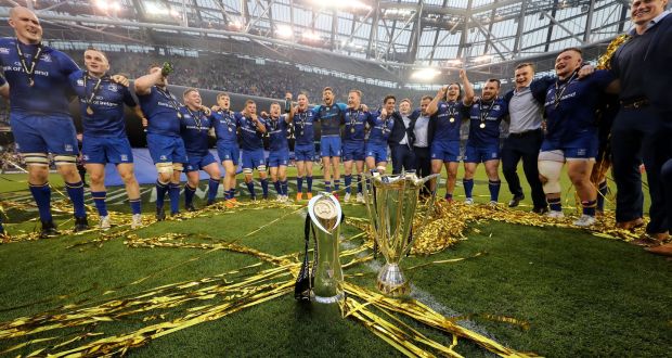 The Leinster players celebrate with the Pro14 and Champions Cup trophies after their win over the Scarlets last season. Photograph: Billy Stickland/Inpho
