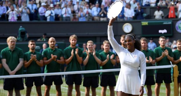 Serena Williams with the runners-up trophy after her Wimbledon final defeat to Angelique Kerber. Photograph: Toby Melville/Reuters